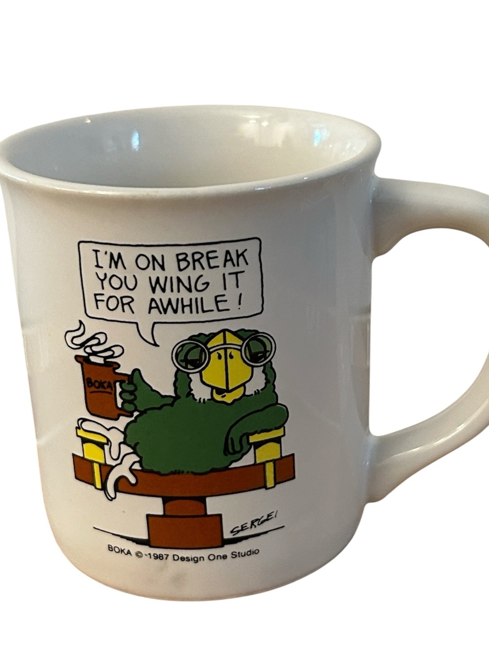 Vintage BOKA design one studio mug green parrot at desk with coffee I’m on Break
